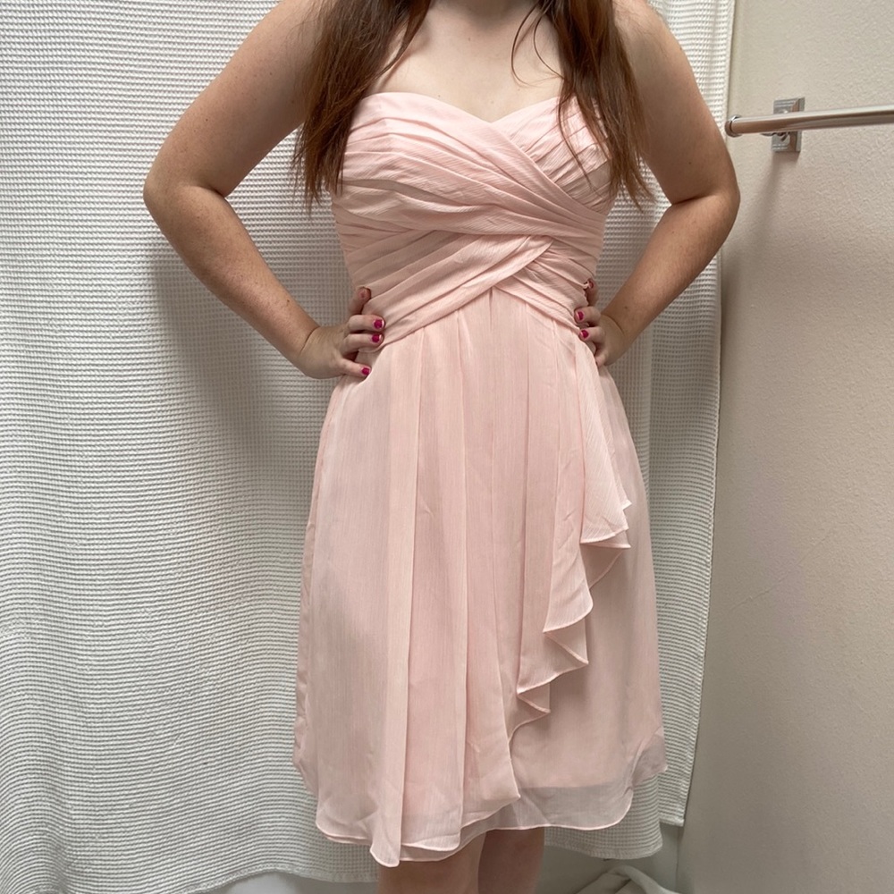 Women’s NWT David’s Bridal pink “petal colored” strapless dress. Size 4.